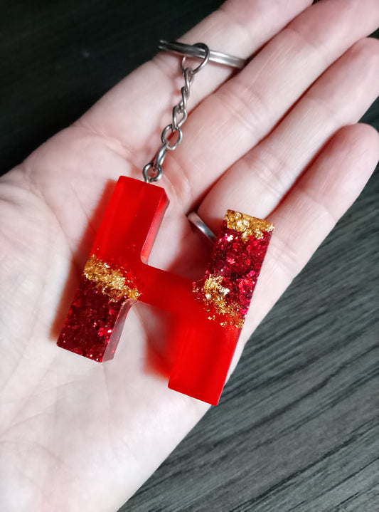 porte clé H rouge or