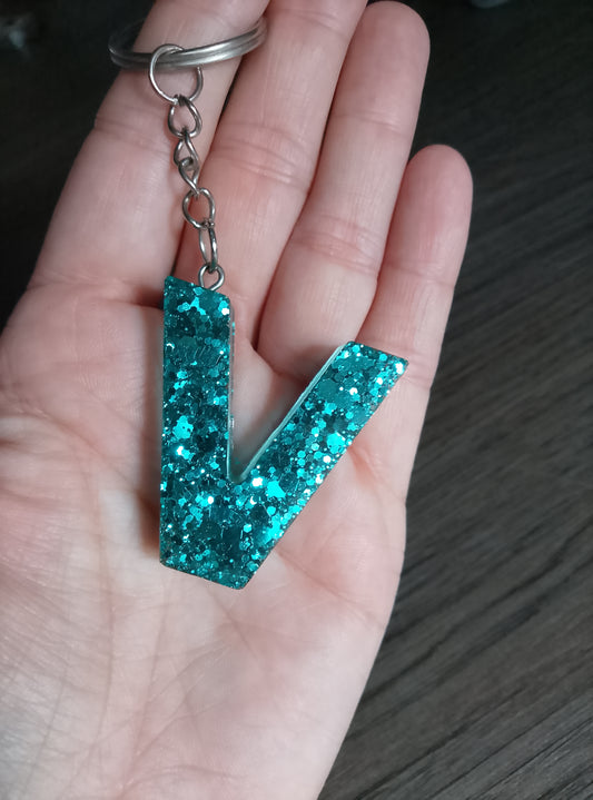 porte clé V bleue