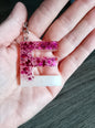 porte clé E blanc et rose